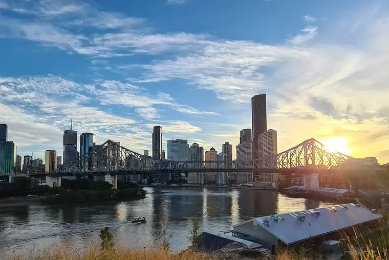 The Brisbane skyline and the Story Bridge at sunset.