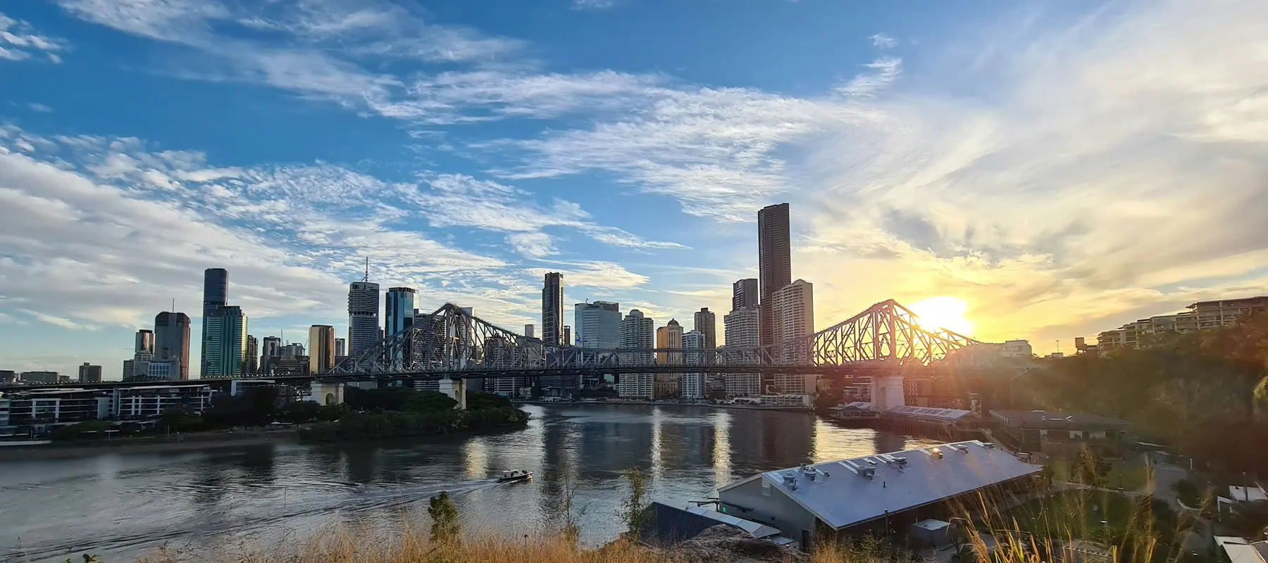 The Brisbane skyline and the Story Bridge at sunset.