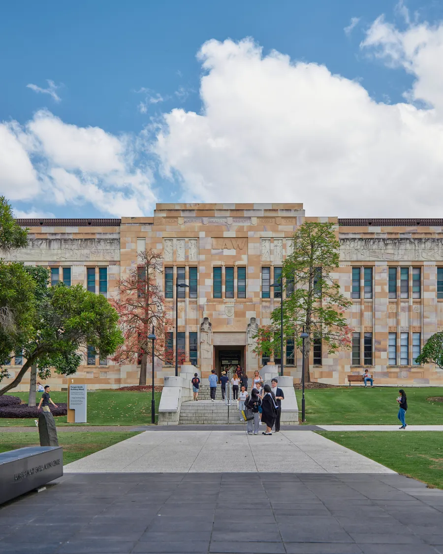 The Forgan Smith Building at the University of Queensland in Brisbane, with students on the path in front.